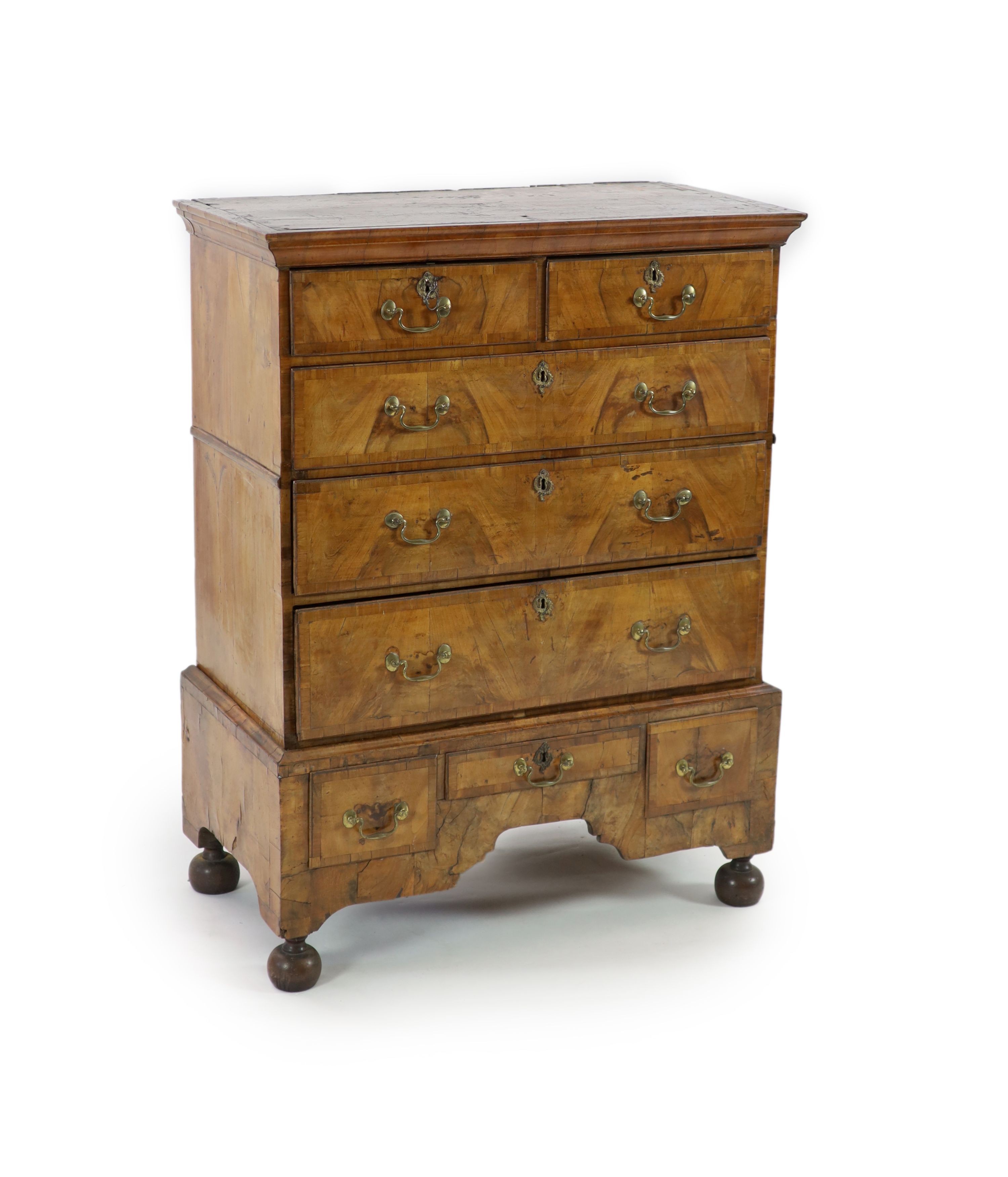 A George II walnut chest on stand W.102cm D.51cm H.132cm